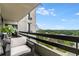An inviting balcony with ample outdoor seating and a sprawling city view at 2660 Peachtree Nw Rd # 13F, Atlanta, GA 30305