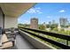 Balcony with beautiful views of the city skyline and surrounding trees at 2660 Peachtree Nw Rd # 13F, Atlanta, GA 30305