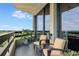 Beautiful balcony setup with cushioned seating and views of surrounding nature at 2660 Peachtree Nw Rd # 13F, Atlanta, GA 30305