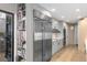 Well-appointed kitchen featuring modern appliances, stylish cabinets, and a pantry at 2660 Peachtree Nw Rd # 13F, Atlanta, GA 30305
