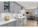 Well-appointed kitchen featuring modern cabinets, sleek countertops, and stainless steel appliances at 2660 Peachtree Nw Rd # 13F, Atlanta, GA 30305