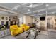 Open-concept living and dining area with contemporary decor, hardwood floors, and ample natural light at 2660 Peachtree Nw Rd # 13F, Atlanta, GA 30305
