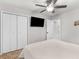 Bright bedroom with a large closet, TV, and natural light at 1000 Coan Dr, Locust Grove, GA 30248