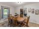 Dining room with wood table and decor at 1000 Coan Dr, Locust Grove, GA 30248