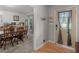 Inviting entryway featuring hardwood floors and a view into the dining area at 1000 Coan Dr, Locust Grove, GA 30248