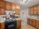 Kitchen featuring wood cabinets at 1000 Coan Dr, Locust Grove, GA 30248