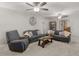 Inviting living room with plush seating, neutral carpet, and ample natural light at 1000 Coan Dr, Locust Grove, GA 30248