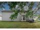 Spacious backyard with lush green lawn and two-story house with neutral siding at 1964 Cutters Mill Way, Lithonia, GA 30058