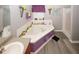Bathroom showcasing a corner tub with decorative accents, as well as the shower at 1964 Cutters Mill Way, Lithonia, GA 30058