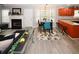 The dining area and kitchen flow from the living area and features barstool seating and modern decor at 1964 Cutters Mill Way, Lithonia, GA 30058