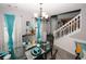 Bright dining room with glass-top table, black chairs, and stylish decor at 1964 Cutters Mill Way, Lithonia, GA 30058