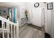 Inviting entryway with gray walls, trendy lighting, and decorative console table with stairway access at 1964 Cutters Mill Way, Lithonia, GA 30058