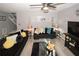 Spacious living room with modern decor, neutral walls, and plenty of natural light from nearby windows at 1964 Cutters Mill Way, Lithonia, GA 30058