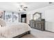 Spacious bedroom with lots of light, neutral color palette, and decorative furnishings at 505 Hampton Crossing, Woodstock, GA 30188