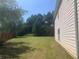 Lush, expansive backyard perfect for outdoor activities and entertaining at 2118 Water Mill Ct, Buford, GA 30519