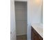 Bathroom featuring a vanity with white countertop and ample storage at 2118 Water Mill Ct, Buford, GA 30519