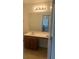 Bright bathroom featuring a large vanity with a sink and overhead lighting at 2118 Water Mill Ct, Buford, GA 30519