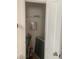 A small walk-in closet with a wire shelf and security system components at 2118 Water Mill Ct, Buford, GA 30519
