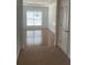 Dining room with hardwood floors, wainscoting, and a decorative chandelier at 2118 Water Mill Ct, Buford, GA 30519