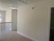 Hallway with neutral paint, carpeted floors, and wrought iron railing at 2118 Water Mill Ct, Buford, GA 30519