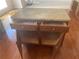 Close-up of kitchen island with cabinets and drawers for storage, and granite countertop at 2118 Water Mill Ct, Buford, GA 30519