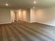 Carpeted bedroom with neutral paint and multiple doorways at 3382 Milan Ct # 3 Appx/Plan Sqft 3327, Douglasville, GA 30135