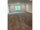 Large carpeted bedroom features natural light and neutral paint at 3382 Milan Ct # 3 Appx/Plan Sqft 3327, Douglasville, GA 30135