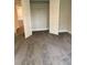 Carpeted bedroom with closet featuring shelving at 3382 Milan Ct # 3 Appx/Plan Sqft 3327, Douglasville, GA 30135
