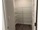 Walk-in pantry with multiple shelves for maximum storage at 3382 Milan Ct # 3 Appx/Plan Sqft 3327, Douglasville, GA 30135