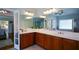 Bathroom with double sink vanity, and a seperate bathtub and shower area at 700 Broadlands Ln, Powder Springs, GA 30127
