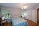 Bedroom features hardwood floors and natural light at 700 Broadlands Ln, Powder Springs, GA 30127