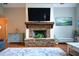 Cozy living room with stone fireplace and vaulted ceilings at 700 Broadlands Ln, Powder Springs, GA 30127