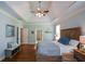 Spacious bedroom features hardwood floors and a lovely ensuite bathroom at 700 Broadlands Ln, Powder Springs, GA 30127