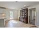 Cozy dining area with a classic hutch, open to kitchen, and door to deck at 7144 Carolyn Cir, Lithia Springs, GA 30122