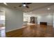 Inviting living area with hardwood floors, great flow, and a glimpse into the updated kitchen at 7144 Carolyn Cir, Lithia Springs, GA 30122