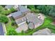 Aerial shot highlighting the home's brick exterior and meticulously kept grounds at 8230 Royal Melbourne Way, Duluth, GA 30097