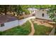Large backyard with a detached shed and gravel area at 91 Rogers Se St, Atlanta, GA 30317