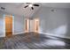 Spacious bedroom with vaulted ceilings and gray flooring, featuring multiple doorways and ample light at 91 Rogers Se St, Atlanta, GA 30317
