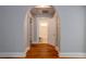 Hallway view leading to a bathroom with a tile shower visible through the open door at 91 Rogers Se St, Atlanta, GA 30317