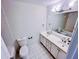 Bathroom with a double sink vanity, white cabinets and tile floors, with a bathtub and shower at 1282 Harris Commons Pl, Roswell, GA 30076