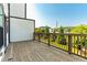 Relax on this wooden deck, offering an ideal outdoor space for enjoying the surrounding greenery and sunshine at 2076 Holtz Ln, Atlanta, GA 30318