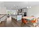 Open-concept kitchen with modern cabinetry, large island, and stainless steel appliances at 2076 Holtz Ln, Atlanta, GA 30318