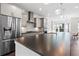 Modern kitchen featuring stainless steel appliances, gray cabinetry, and quartz countertops at 2076 Holtz Ln, Atlanta, GA 30318