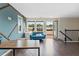 Spacious room leading to outdoor terrace area with hardwood floors and lots of natural light at 2076 Holtz Ln, Atlanta, GA 30318