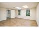 Finished basement with tile flooring, multiple windows and an open layout at 3420 Cranborne, Marietta, GA 30062