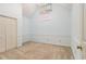 Bedroom featuring light blue walls, carpeted floors, and a double door closet at 3420 Cranborne, Marietta, GA 30062