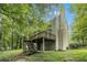 Exterior of home featuring a spacious deck with stairs, a chimney, and a backyard at 3420 Cranborne, Marietta, GA 30062