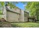 Exterior of home featuring a spacious deck and a lush backyard that offers privacy at 3420 Cranborne, Marietta, GA 30062