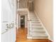 Spacious foyer featuring hardwood floors and a grand staircase at 3420 Cranborne, Marietta, GA 30062