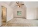 Main bedroom featuring vaulted ceilings, an ensuite bathroom, and a ceiling fan at 3420 Cranborne, Marietta, GA 30062